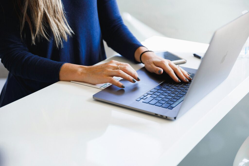 a women searches for a cruise ship job on her computer