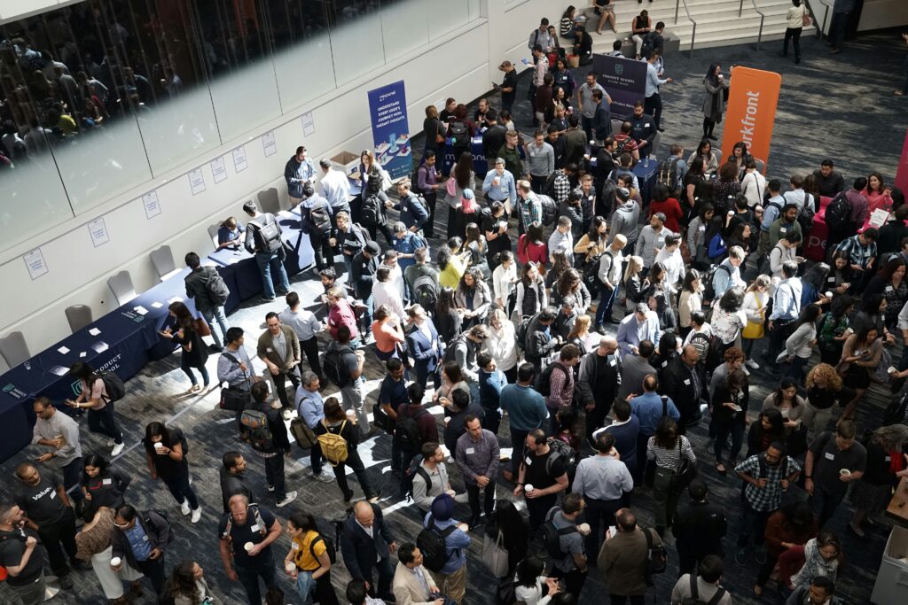 a room packed full of people at a cruise ship job fair