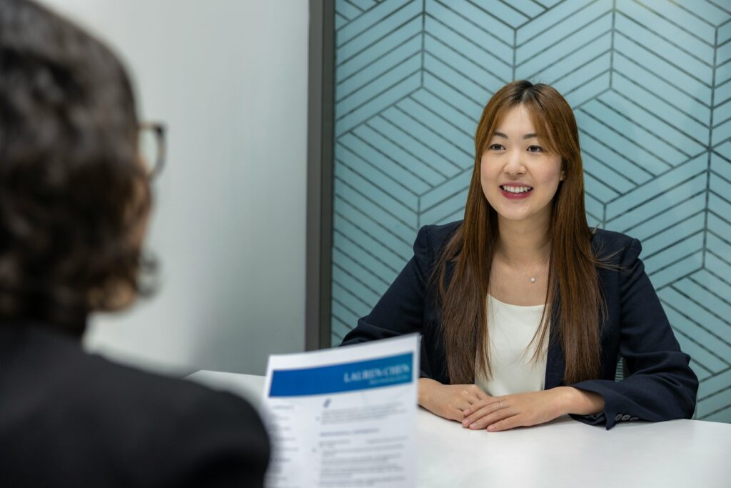 a women has an interview to get a job on a cruise ship