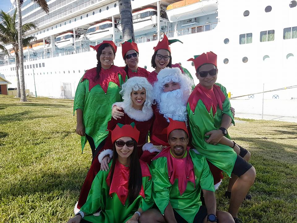youth staff of a cruise ship dresses up for christmas