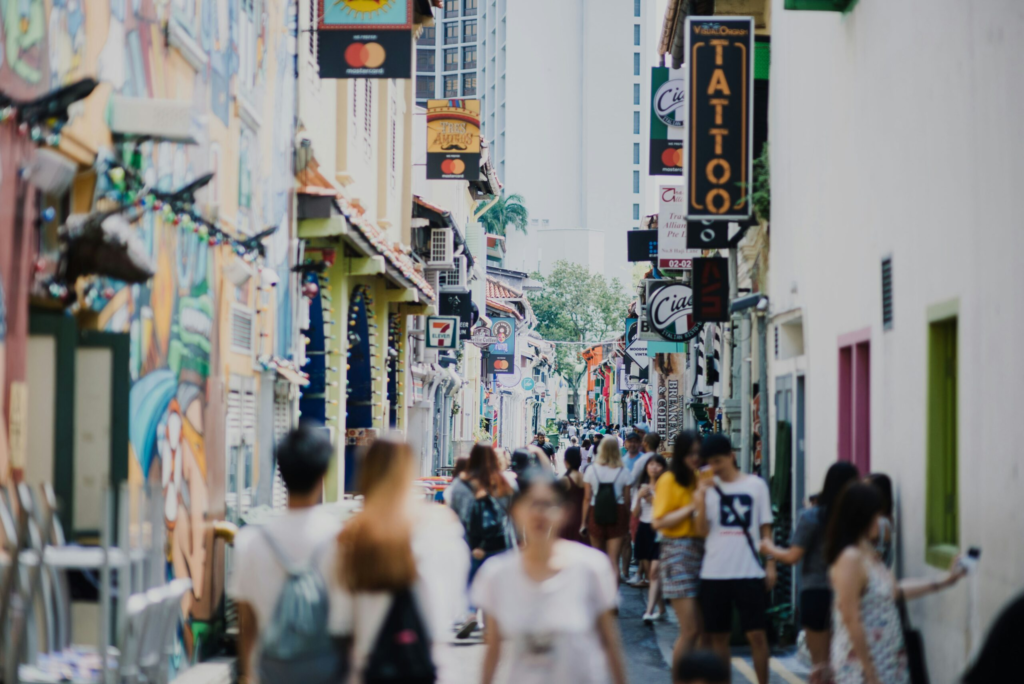 a crowded pedestrian street in Singapore