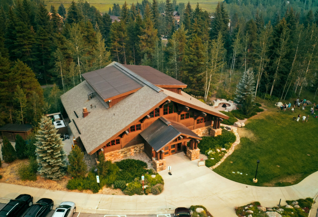 birds eye view of the main lodge at a guest ranch in the forrest